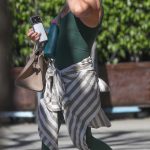 Hilary Duff in a Green Workout Ensemble Leaves a Workout Session in Los Angeles 03/17/2026