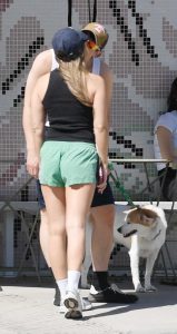 Olivia Holt in a Black Cap