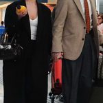 Dove Cameron in a Black Coat Arrives at Fiumicino Airport in Rome 04/27/2026