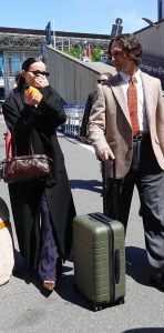 Dove Cameron in a Black Coat