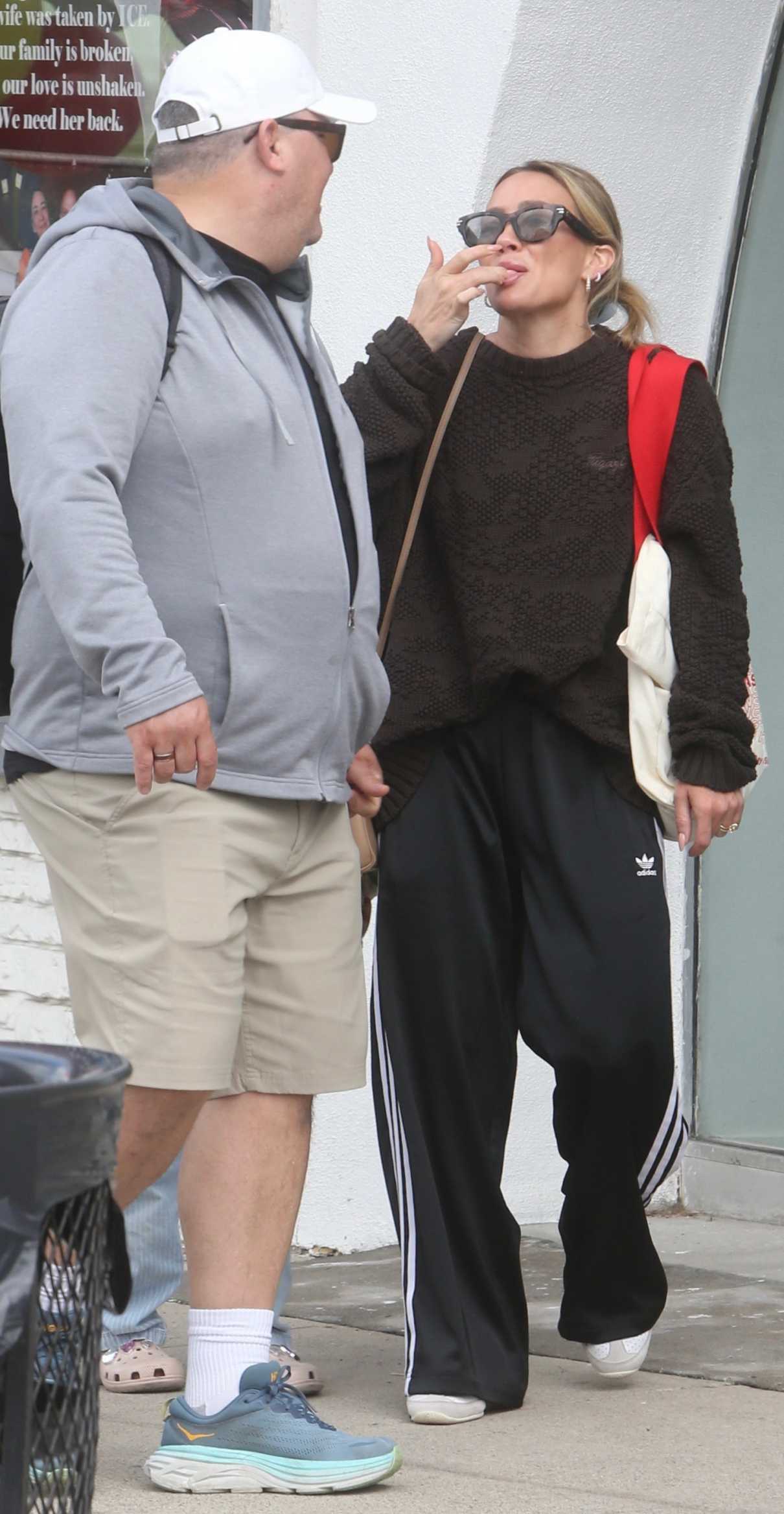 Hilary Duff in a Black Adidas Track Pants