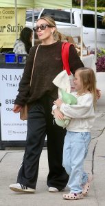 Hilary Duff in a Black Adidas Track Pants