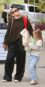 Hilary Duff in a Black Adidas Track Pants