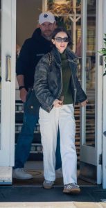 Lily Collins in a Black Leather Jacket