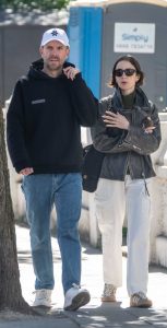 Lily Collins in a Black Leather Jacket