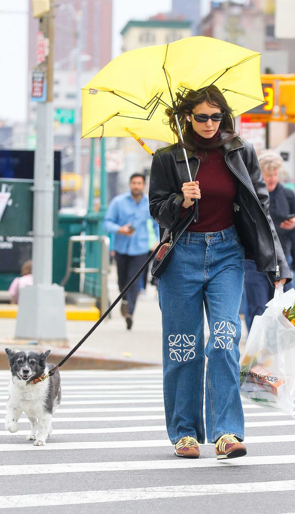 Nina Dobrev in a Black Leather Jacket