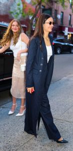 Nina Dobrev in a Navy Pinstriped Ensemble