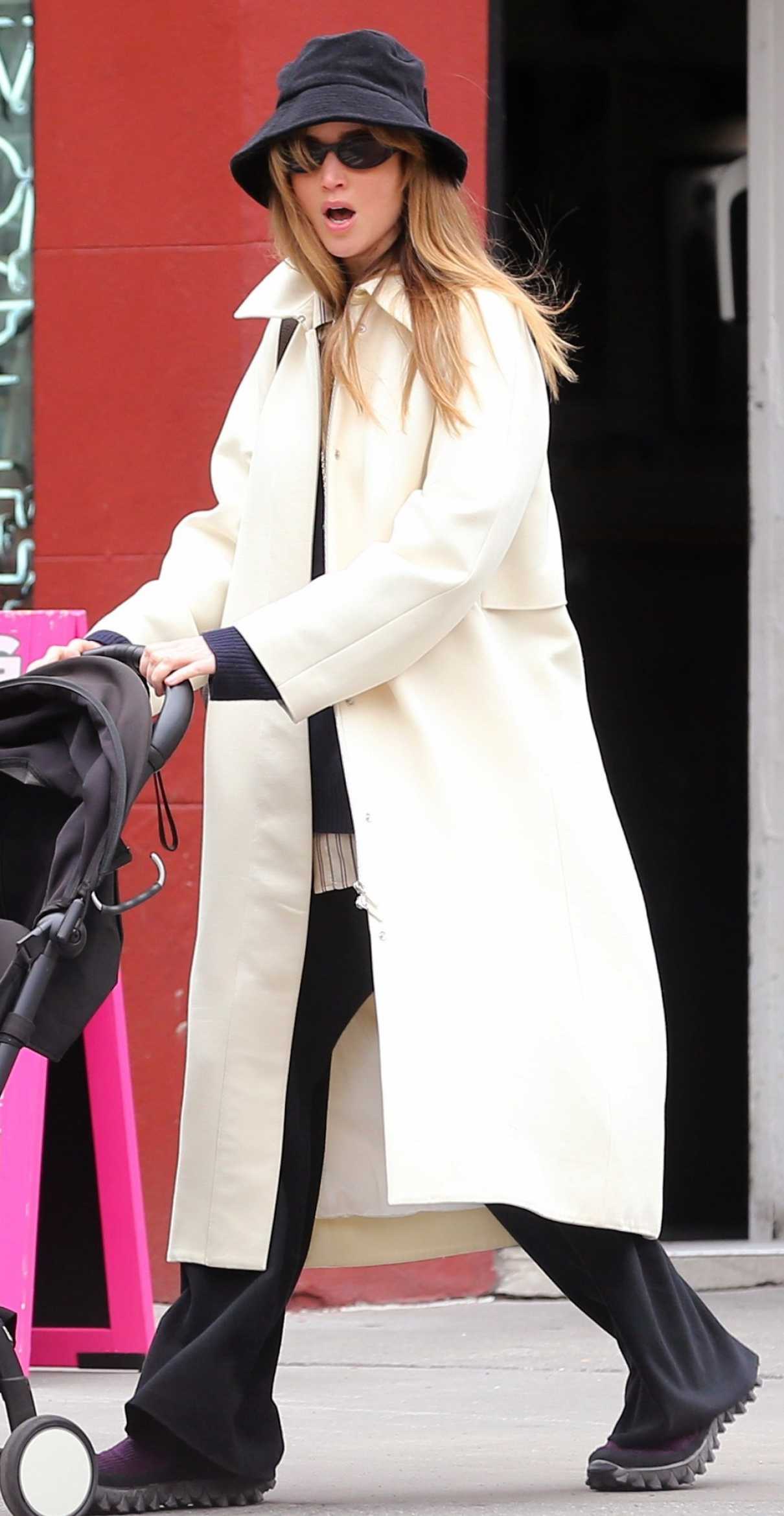 Jennifer Lawrence in a White Trench Coat
