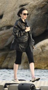 Lily Collins in a Black Leather Jacket
