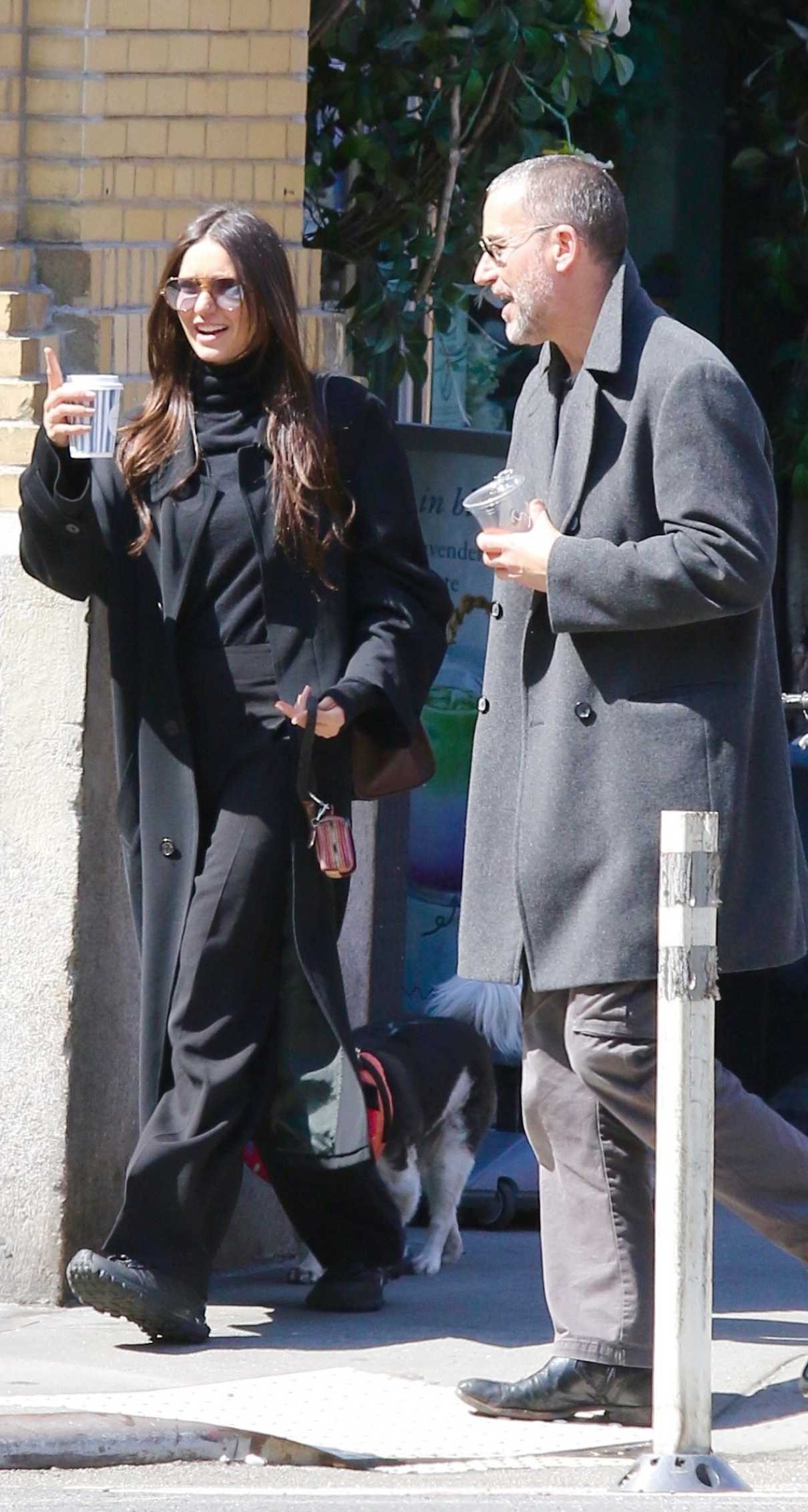 Nina Dobrev in a Black Coat