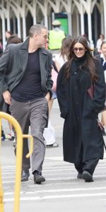 Nina Dobrev in a Black Coat