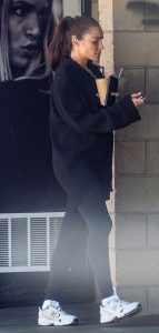 Olivia Culpo in a White New Balance Sneakers
