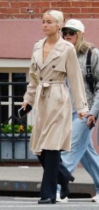 Olivia Dunne in a Beige Trench Coat