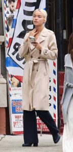 Olivia Dunne in a Beige Trench Coat