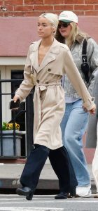 Olivia Dunne in a Beige Trench Coat