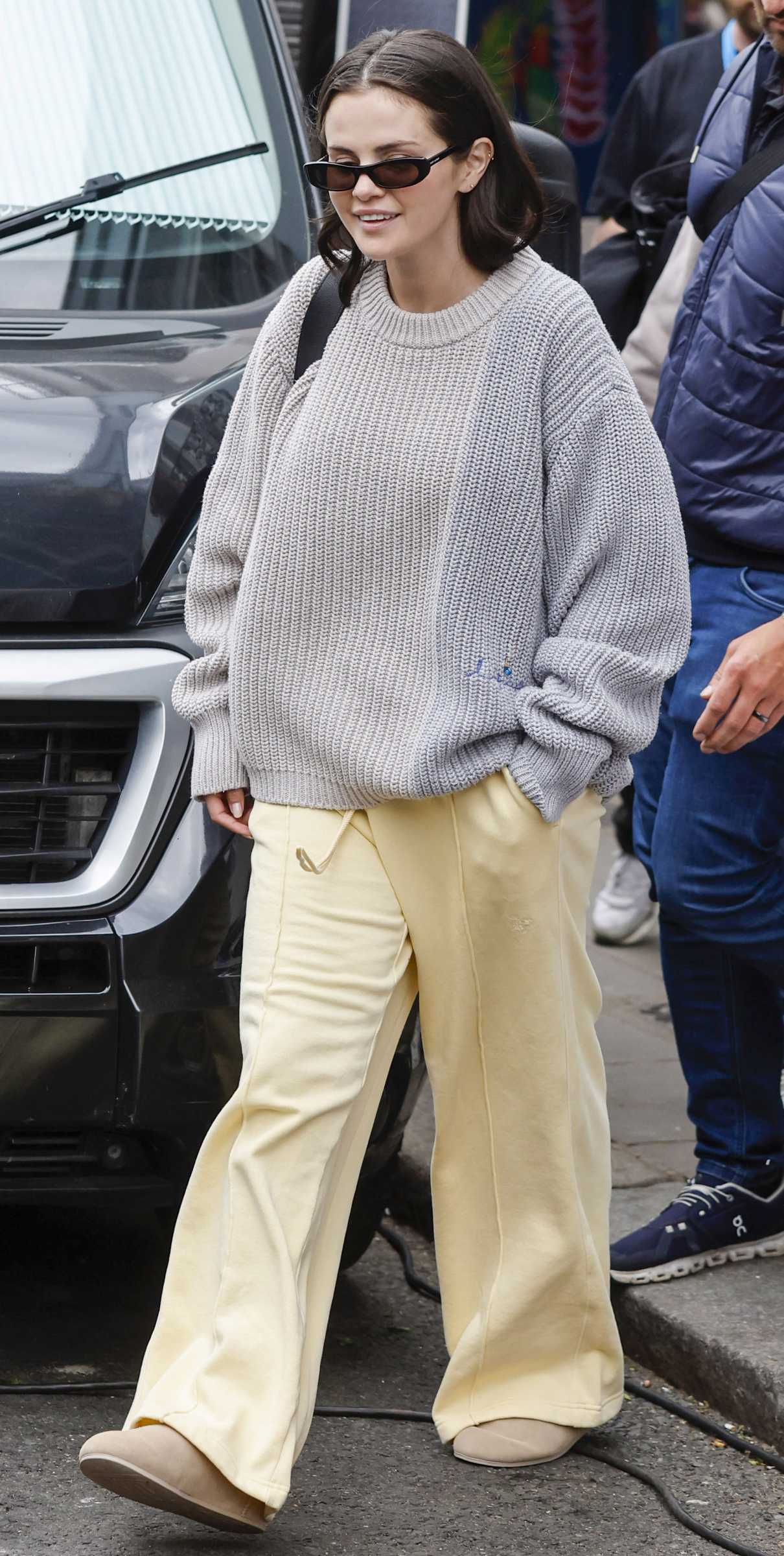 Selena Gomez in a Yellow Sweatpants