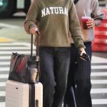 Camila Mendes in an Olive Sweatshirt Arrives with Rudy Mancuso at the Airport in Los Angeles 06/15/2026