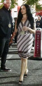 Demi Lovato in a Brown Striped Dress
