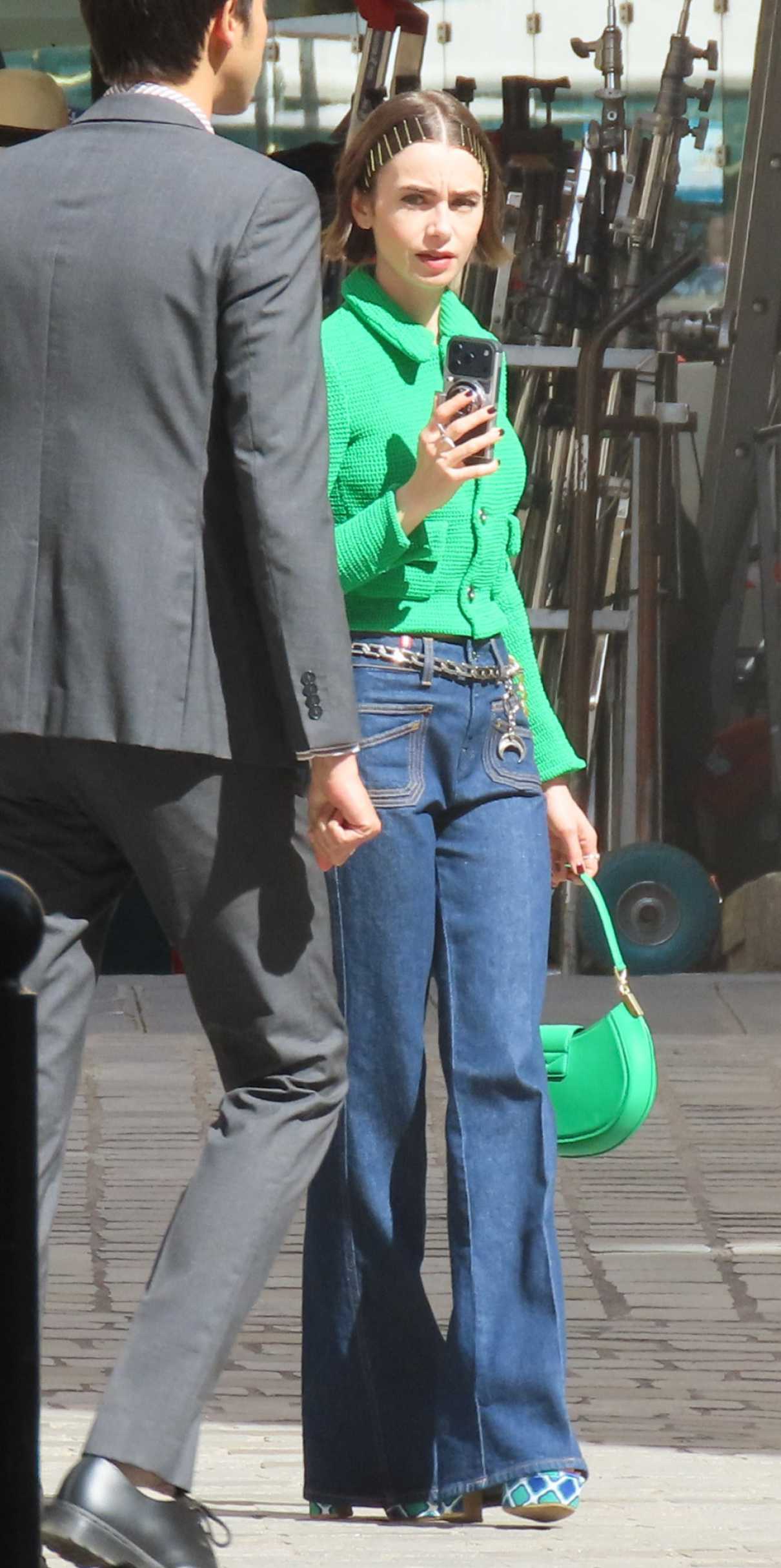Lily Collins in a Green Cardigan