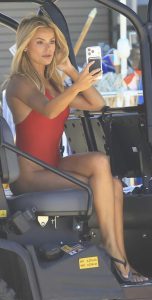 Brooks Nader in a Red Swimsuit