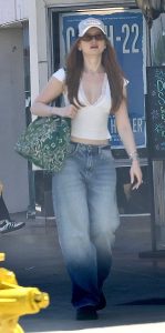 Madelaine Petsch in a Beige Blouse
