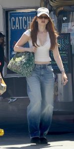 Madelaine Petsch in a Beige Blouse