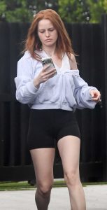Madelaine Petsch in a Black Spandex Shorts