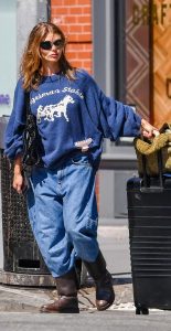 Olivia Jade in a Blue Sweater