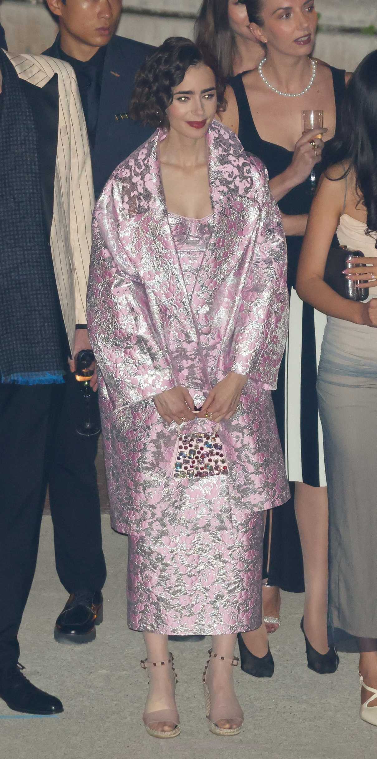 Lily Collins in a Pink and Silver Patterned Ensemble