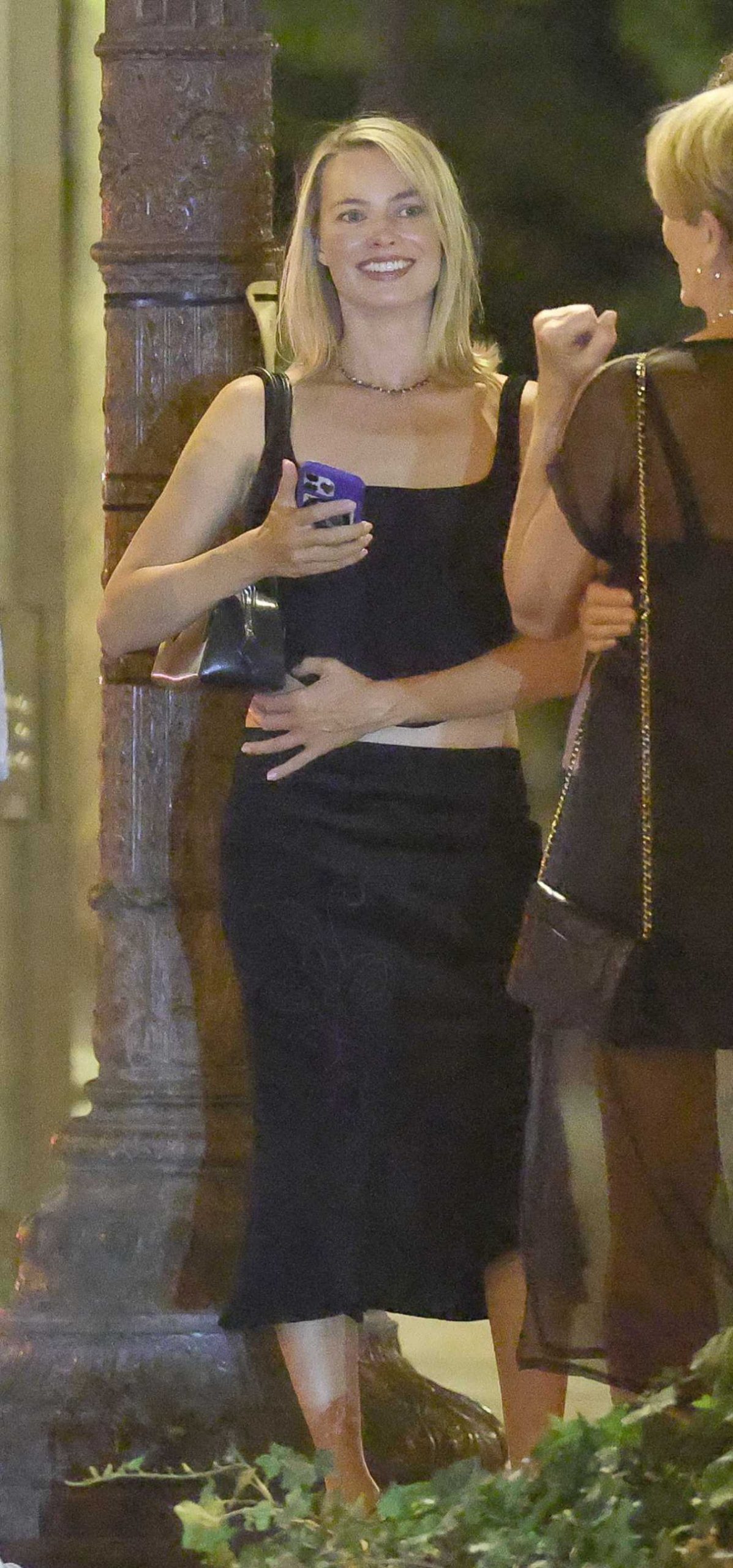 Margot Robbie in a Black Top