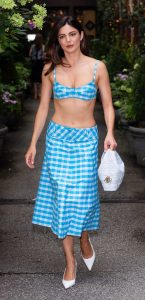 Monica Barbaro in a Blue Plaid Ensemble