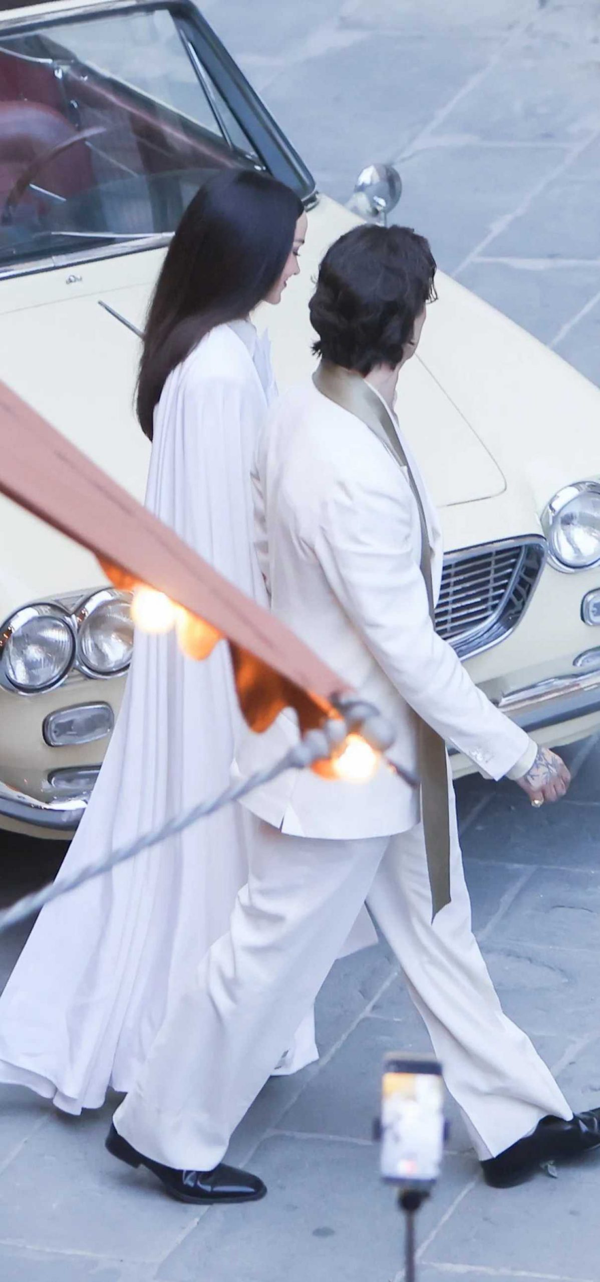 Dove Cameron in a White Ensemble