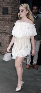 Florence Pugh in a Beige Dress