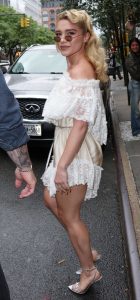 Florence Pugh in a Beige Dress