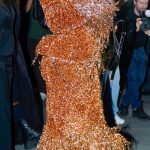 Rihanna in an Orange Embroidered Ensemble Arrives at the Matieres Fecales Fashion Show During 2026 Paris Fashion Week in Paris 09/28/2026