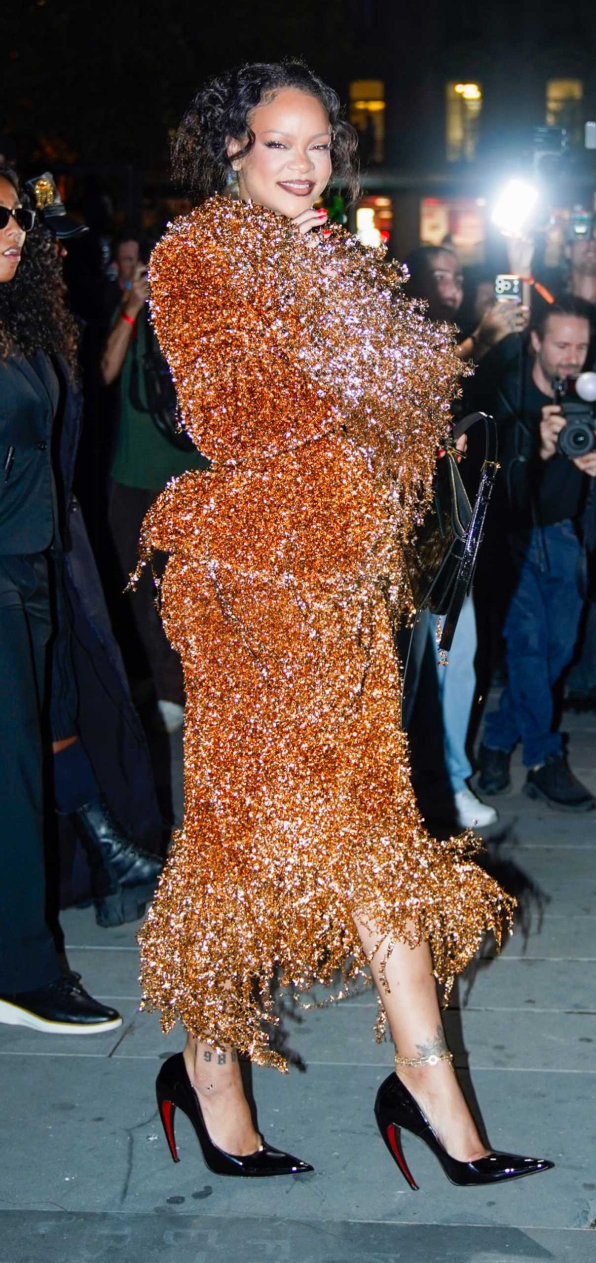 Rihanna in an Orange Embroidered Ensemble