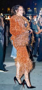 Rihanna in an Orange Embroidered Ensemble