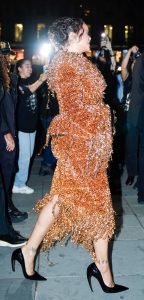 Rihanna in an Orange Embroidered Ensemble