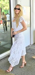 Sydney Sweeney in a White Lace Dress