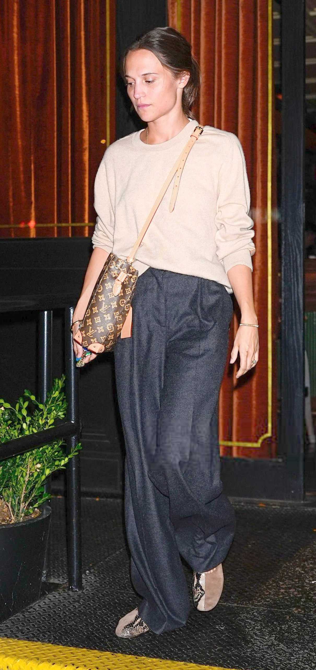 Alicia Vikander in a Black Pants