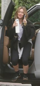 Hilary Duff in a Black Adidas Sneakers