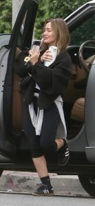 Hilary Duff in a Black Adidas Sneakers