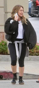 Hilary Duff in a Black Adidas Sneakers