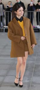 Jenna Ortega in a Tan Coat