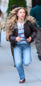 Sydney Sweeney in a Brown Leather Jacket