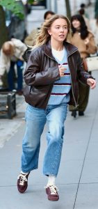 Sydney Sweeney in a Brown Leather Jacket