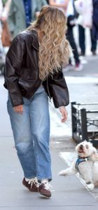 Sydney Sweeney in a Brown Leather Jacket